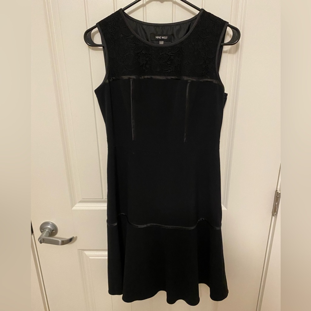 Nine West black dress… lace on the top and back. Size 2 lined.
